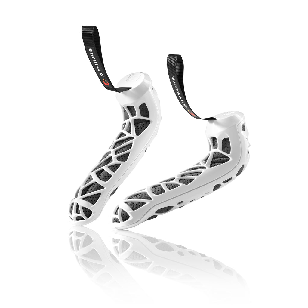 Black and White Drysure Active shoe dryers on a white background.