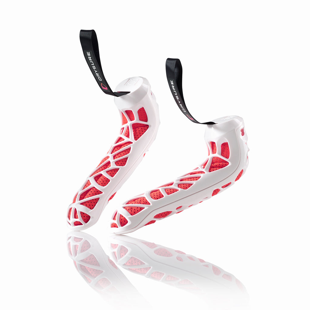 Red and White Drysure Active shoe dryers on a white background.