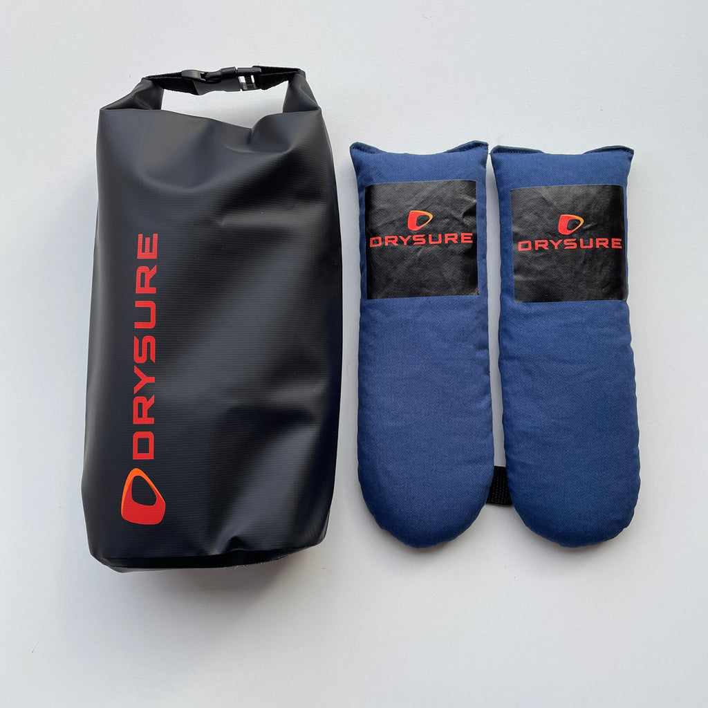 Black Drysure branded drybag next to small drysure essentials item dryer on a white background