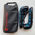 Small Dry bag with orange drysure logo next to Drysure Active shoe dryers in black and blue
